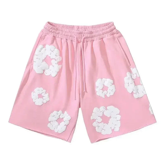 denim tears shorts pink and white